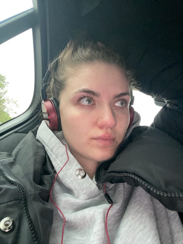 Woman in headphones observed in car in Kommunarka