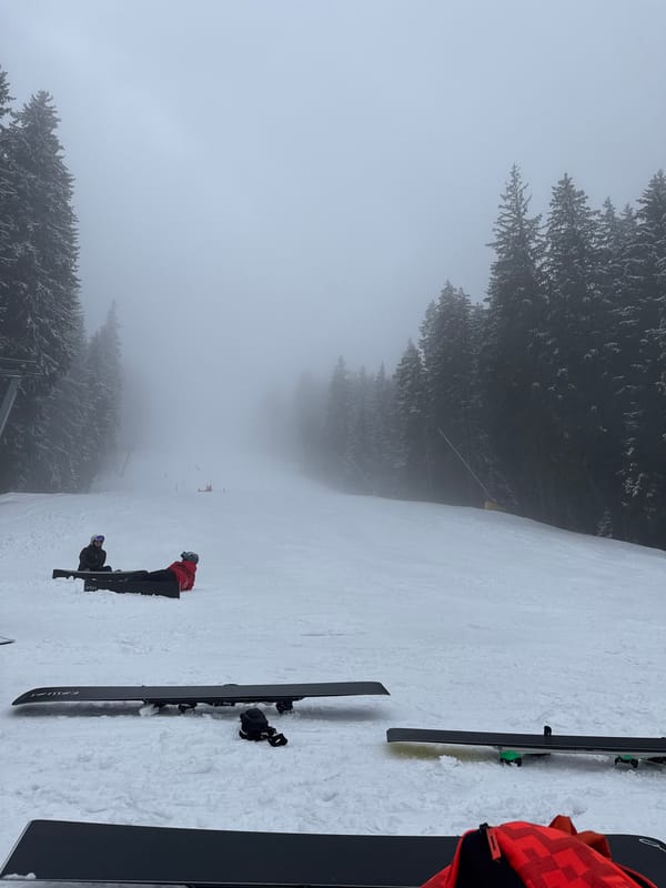 Skiers gather on foggy slopes at Bansko resort