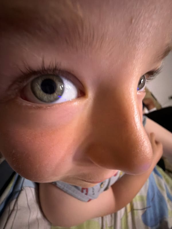Child takes selfies during playtime in Bulgarian village