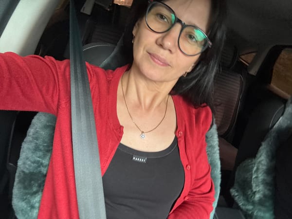 Woman photographed inside car in Chaikovsky, Russia