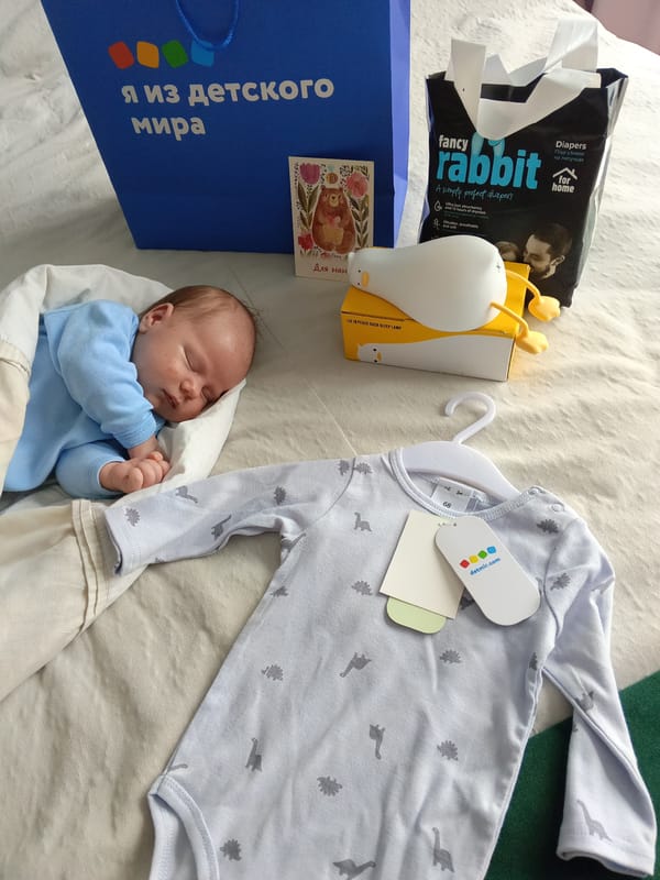 Family morning routine with sleeping baby in Andreyevo, Russia