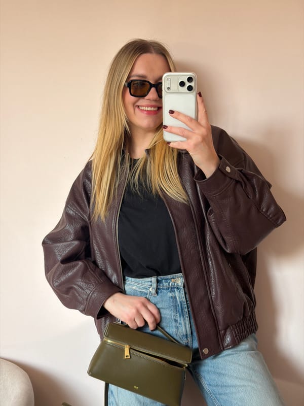 Woman takes multiple selfies in dressing room, car