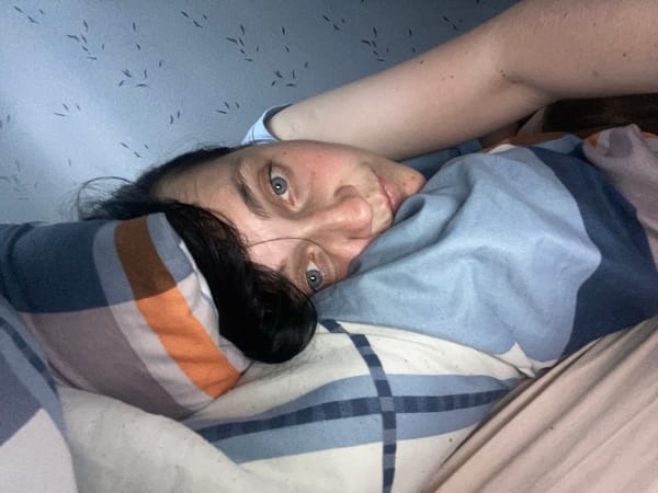 Lazy afternoon at home: bed selfies, a novelty card, a toddler
