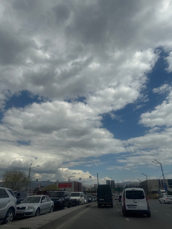 Morning car journey through Tbilisi streets captures urban Georgia