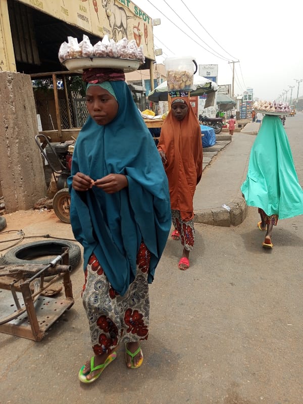 Nigerian street markets buzz with daily commerce activity