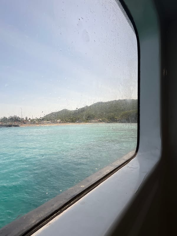 On the water between Karimunjawa's islands, mid-crossing