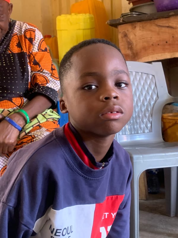 Everyday life and tailoring work inside a Jos home