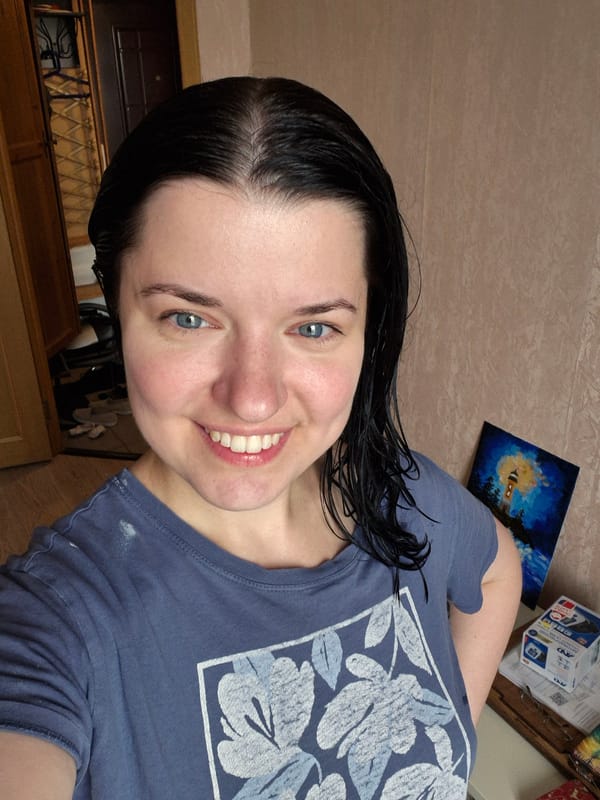 Post-shower selfies on a Saint Petersburg balcony