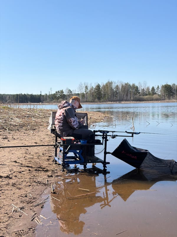 Anglers fish successfully at Chaykovsky lake during sunny morning