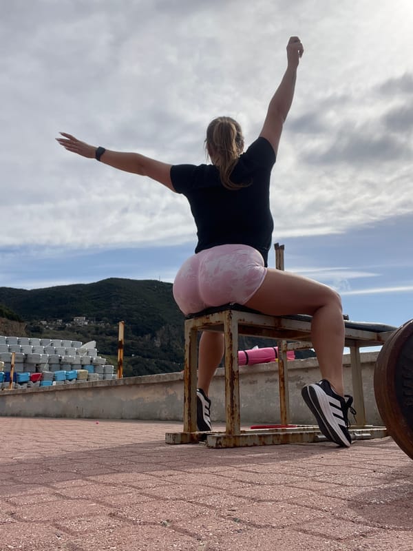 Woman performs outdoor weight training routine in Montenegro