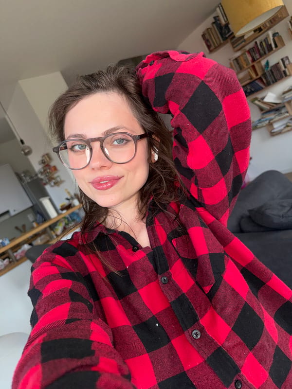 Woman takes selfies indoors in Budapest