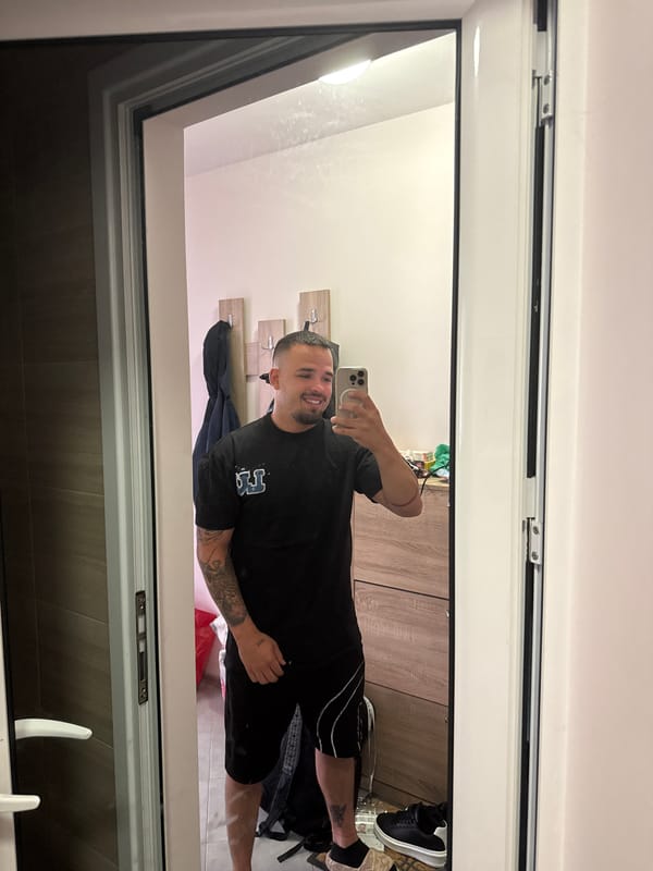 Person takes mirror selfies wearing shark slippers in Blagoevgrad
