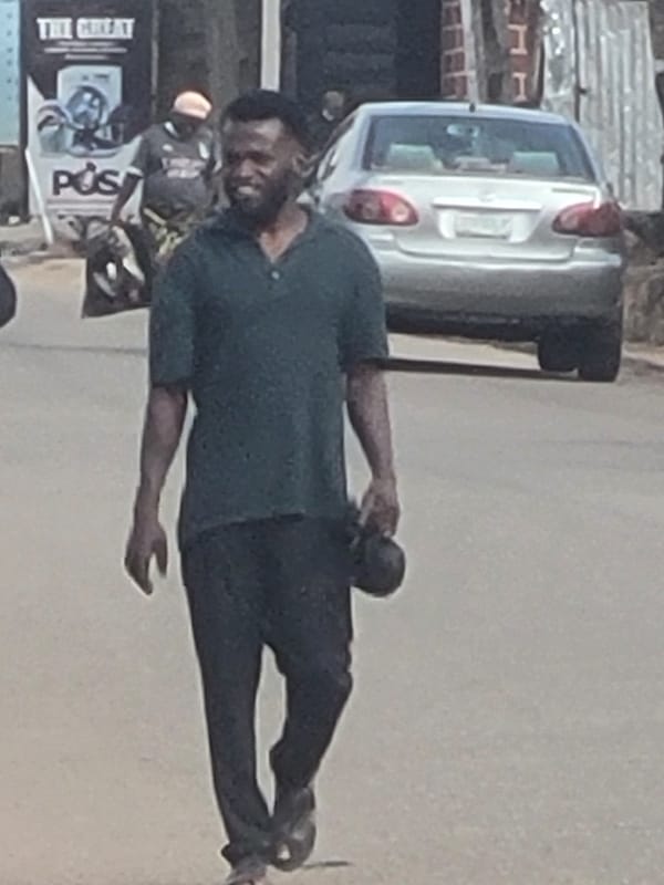 Woman in green leopard print dress spotted on Jos street