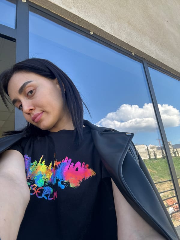 Woman poses for photos wearing Berlin t-shirt in Tbilisi