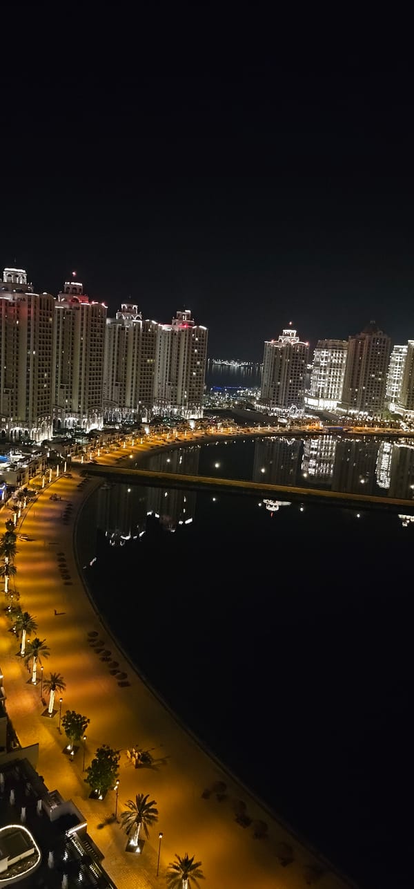 Pearl-Qatar glows at night from above