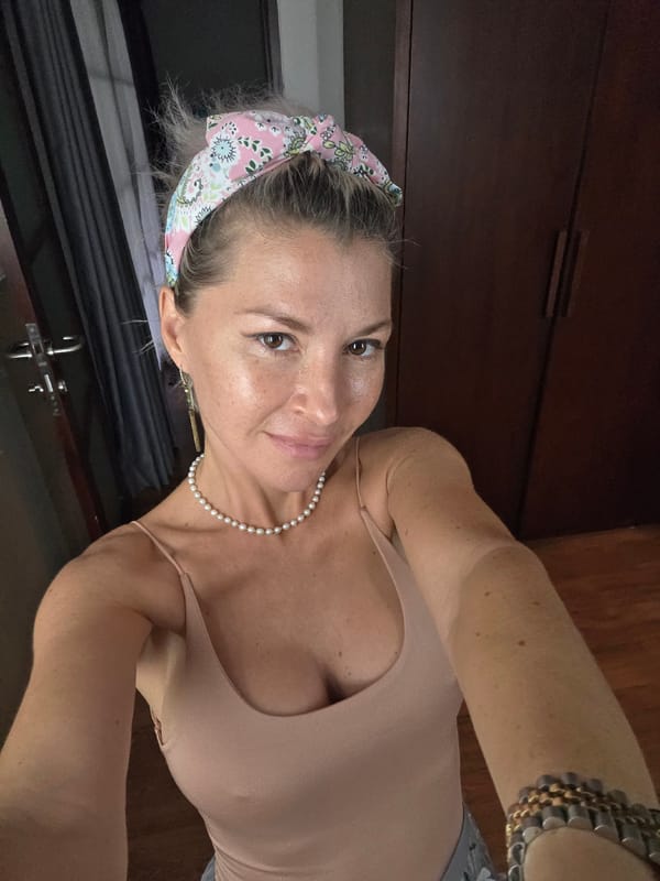 Getting ready in a North Kuta hotel room, outfit check.