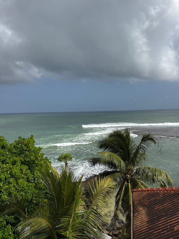 Stormy skies over the Indian Ocean at Goviyapana's rocky coast