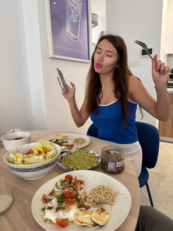 Diners photographing meal at restaurant in Livadia Larnakas, Cyprus