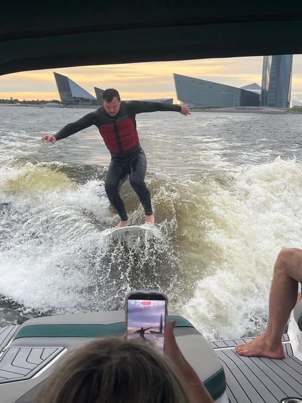 Wakeboarding on a Saint Petersburg waterway on a summer evening