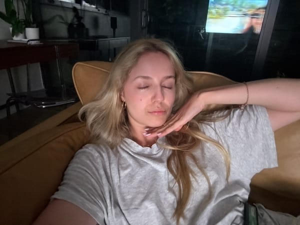 Resting on a couch in Miami, jewelry and details in focus