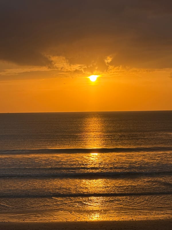 Sunset over Kuta Selatan's resort coast, Bali