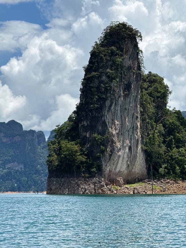 Limestone karsts and turquoise water at Cheow Lan Lake