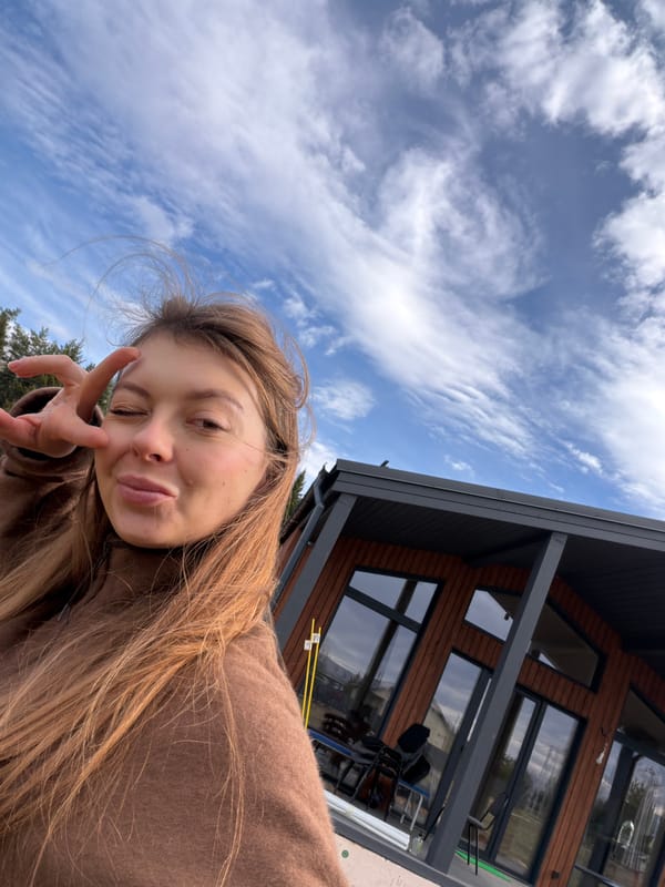 Woman takes selfies, records video in Russian field