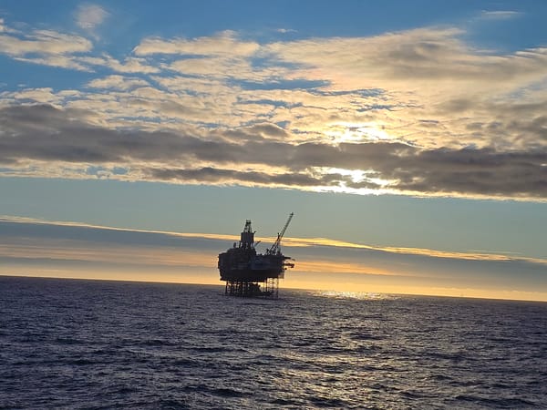 Oil platform observed at sunset in North Sea near Norway