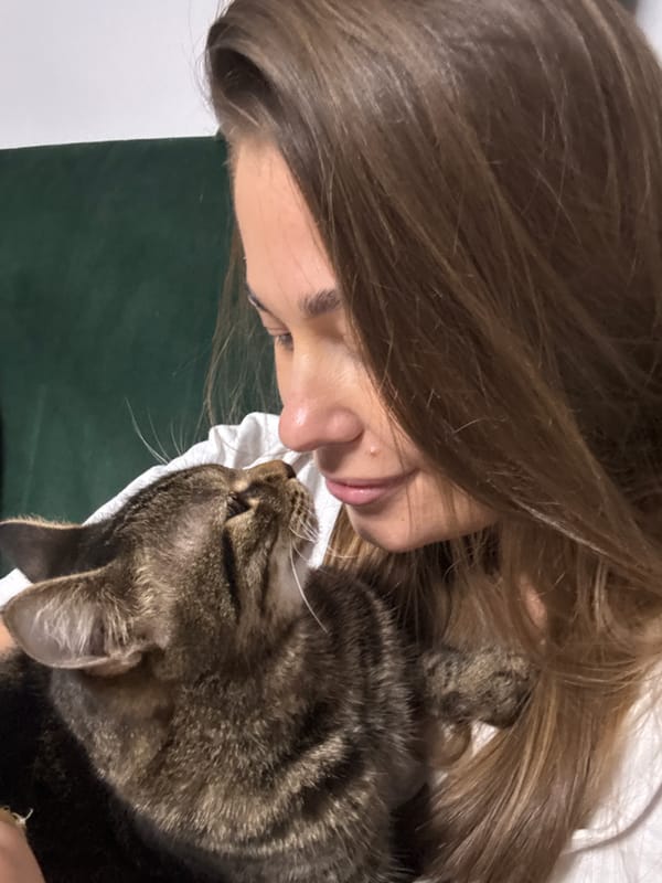 Woman shares tender moments with tabby cat in Chernushka
