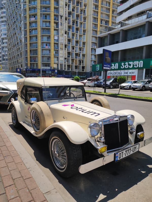 Classic cars and bold architecture along Batumi's summer streets