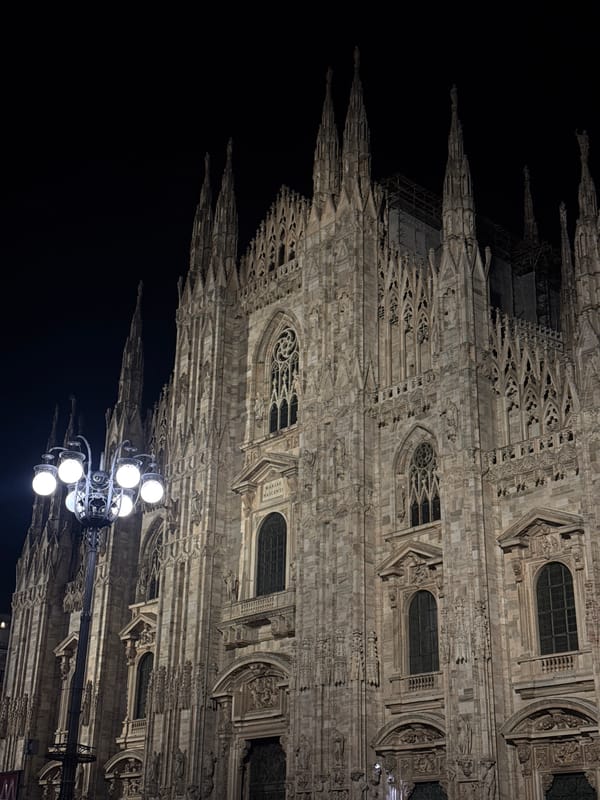 Milan Cathedral photographed illuminated against night sky