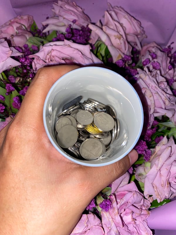 Davao resident organizes coins, keys, household items in early morning