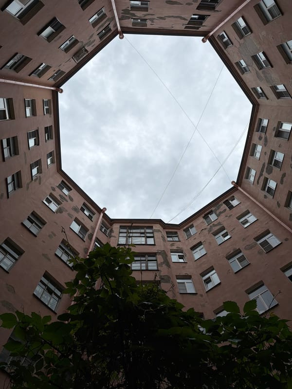 Looking up through a Saint Petersburg well courtyard