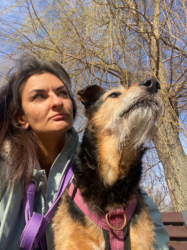 Woman and dog selfie in Moscow park