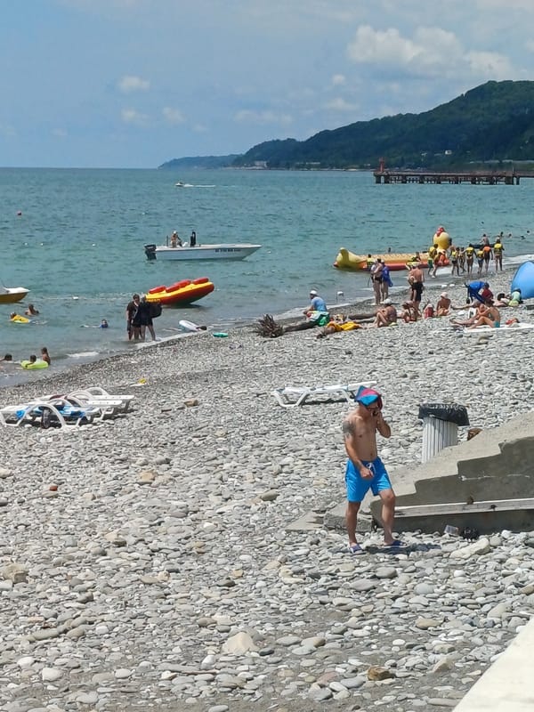 Summer crowd fills Sochi's Black Sea beach on a clear morning