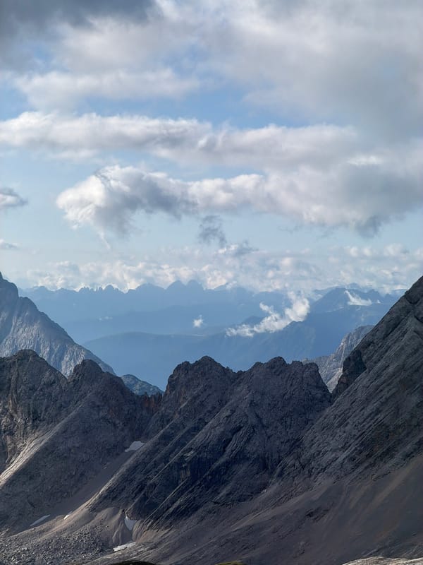 Summer morning in the Bavarian Alps, snow groomer included