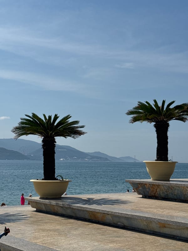 Exploring Nha Trang's beachfront and landmarks on a clear morning