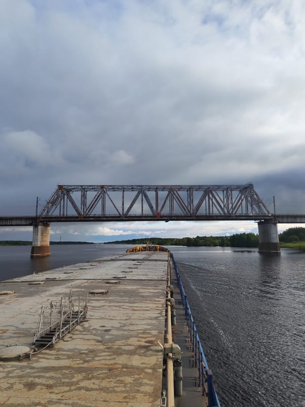 Russian cargo vessel navigates waterways near Tarkanovo bridge