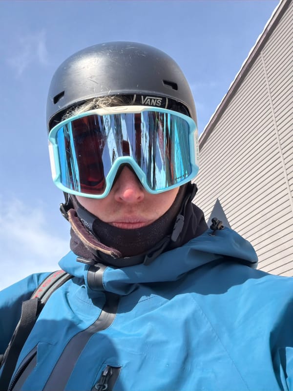 Skiers gather at Niseko resort on sunny winter day