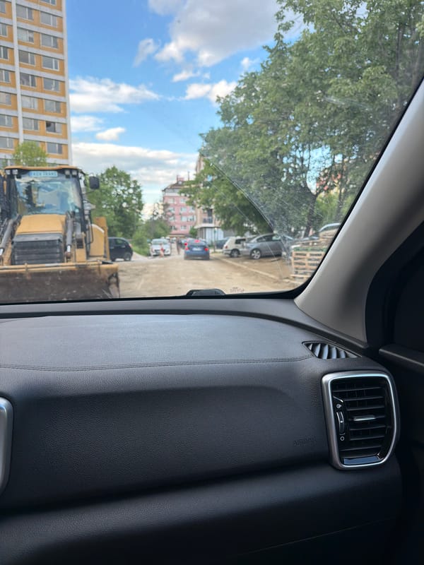 Street view captured from car window in Sofia