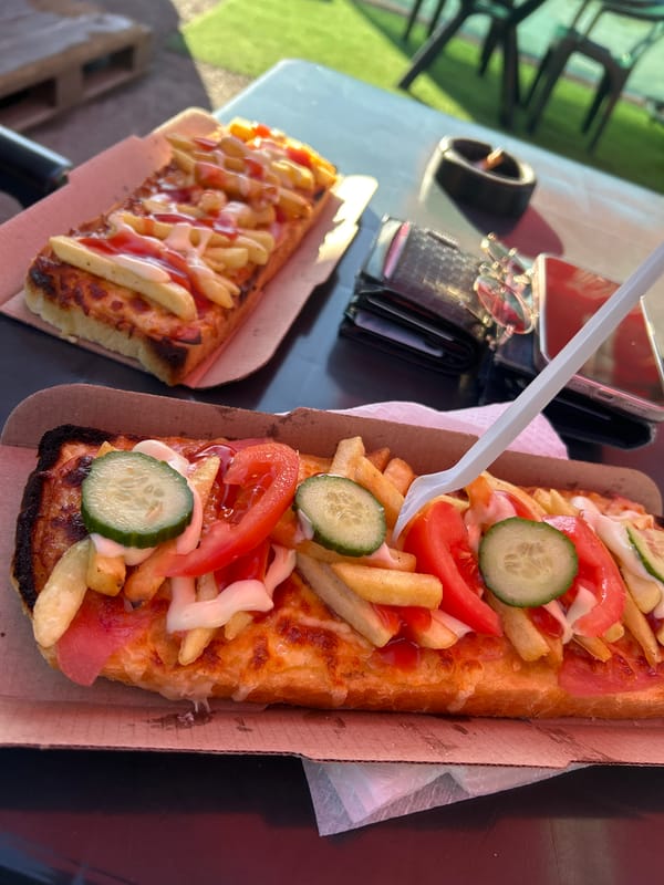 French fry-topped sandwiches photographed in Dimitrovgrad, Bulgaria