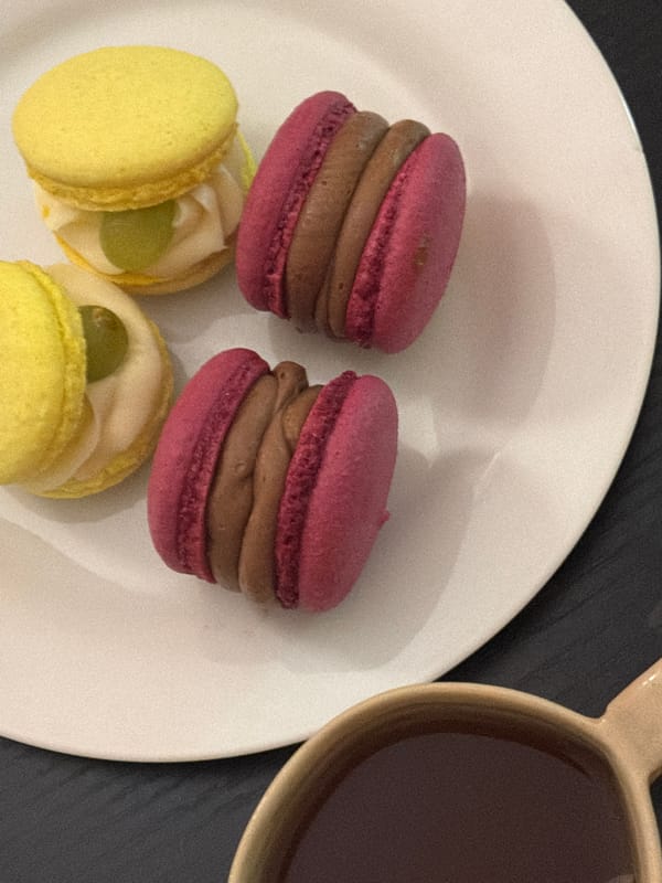 Tel Aviv resident enjoys colorful macarons Friday evening