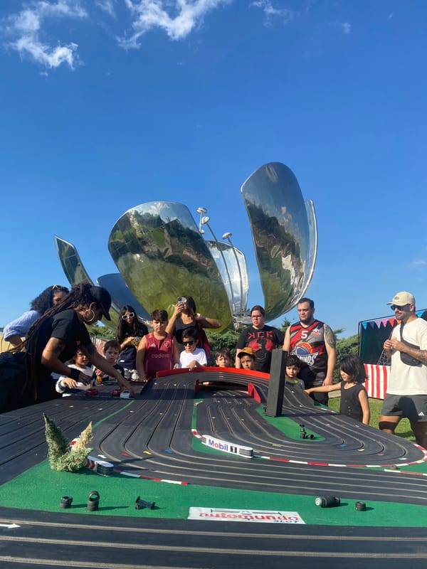 Families gather around slot car track in Buenos Aires