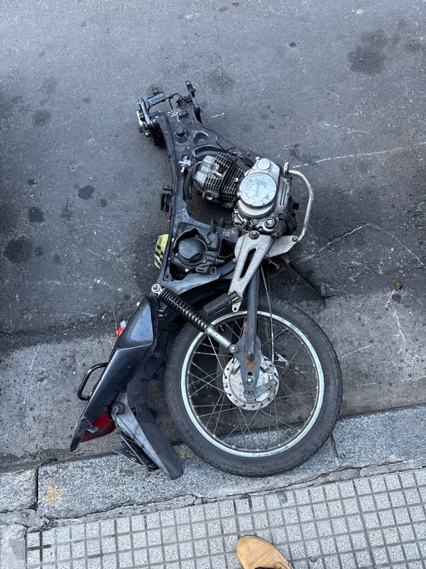 Stripped motorcycle frame, decorated car spotted on Buenos Aires street