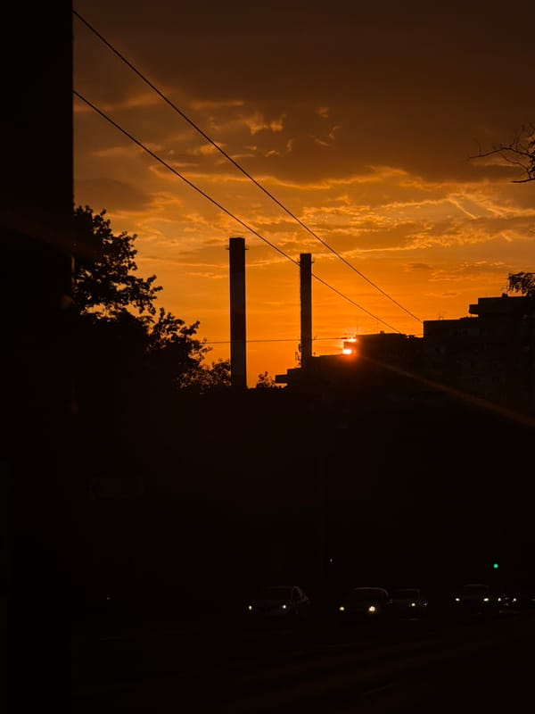 Twilight settles over Vozdovac industrial and residential skyline