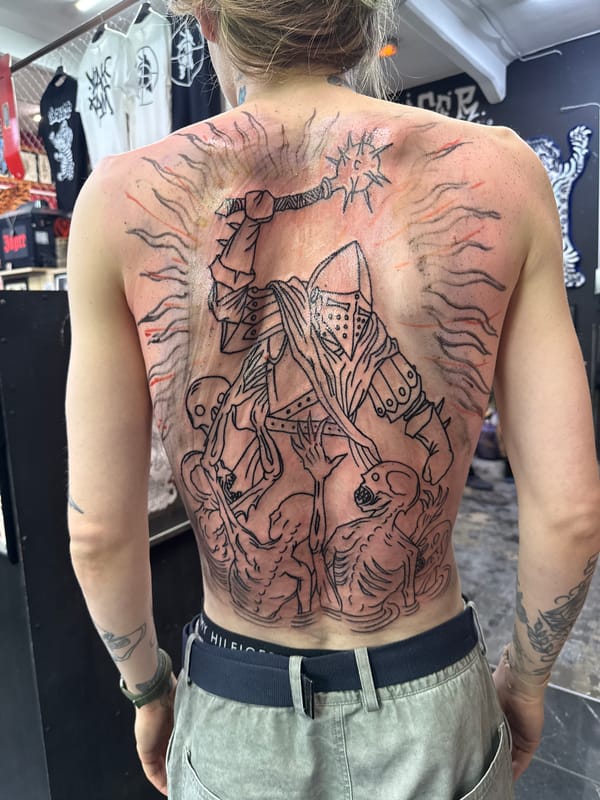 Moscow resident displays elaborate religious, theatrical tattoo artwork