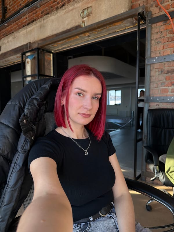 Woman takes selfie, decorative bows observed in Chaikovsky room