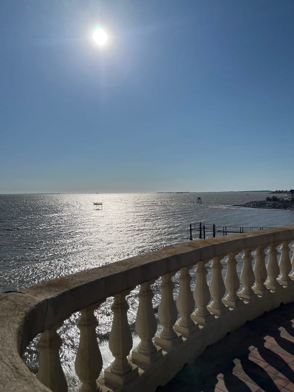 Coastal views from Fouras, France — balconies, beach, and a carrelet