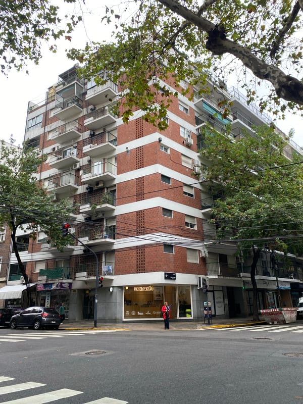 Pedestrian in red jacket spotted on Buenos Aires street
