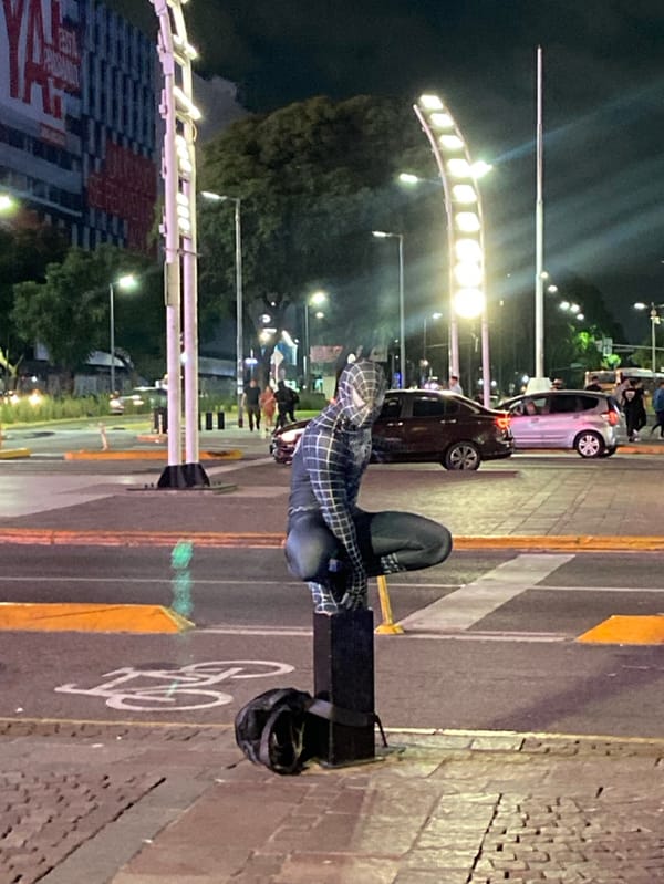 Costumed figure, historic buildings captured in Buenos Aires nighttime scenes